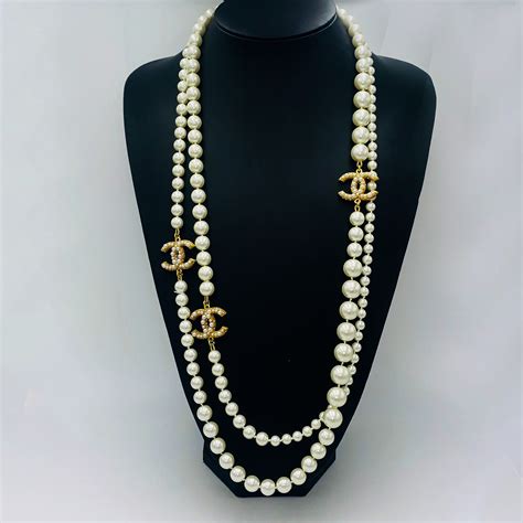 chanel necklace small|Chanel pearl long strand necklaces.